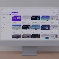 Mockup of a desktop monitor displaying the Modular DS dashboard, showing a centralized view of multiple WordPress websites for updates, monitoring, and management.